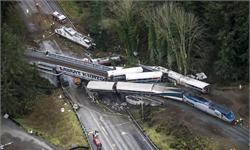 美国发生火车脱轨致6死77伤：首日运行酿悲剧 疑为拐弯太快所致