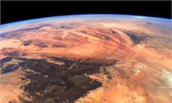 宇航员在国际空间站拍下“撒哈拉之眼”：红橙相间中央凹陷，宛若火星景象